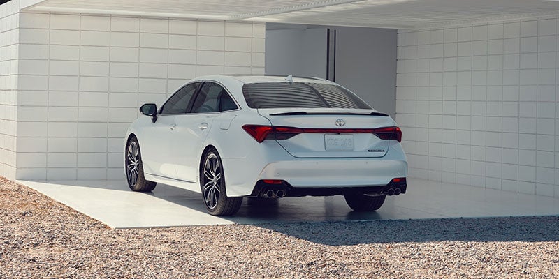 Rear view of a Toyota Avalon parked in a driveway